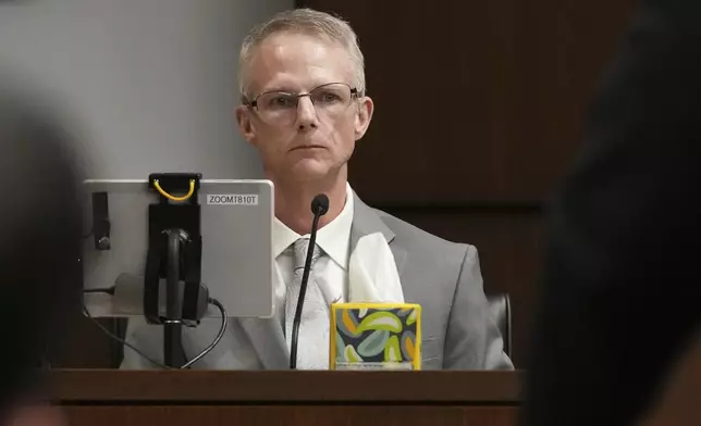 Brian Bodden, detective from City of Highland Park, answers a question from Eric Kalata, an Attorney Chief of Lake County, during the sentencing hearing for Robert E. Crimo III., at the Lake County Courthouse, in Waukegan, Ill., Wednesday, April 23, 2025. (AP Photo/Nam Y. Huh, Pool)