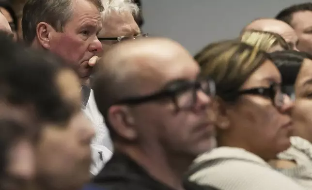 Victims family members react during the sentencing hearing for Robert E. Crimo III., at the Lake County Courthouse, in Waukegan, Ill., Wednesday, April 23, 2025. (AP Photo/Nam Y. Huh, Pool)