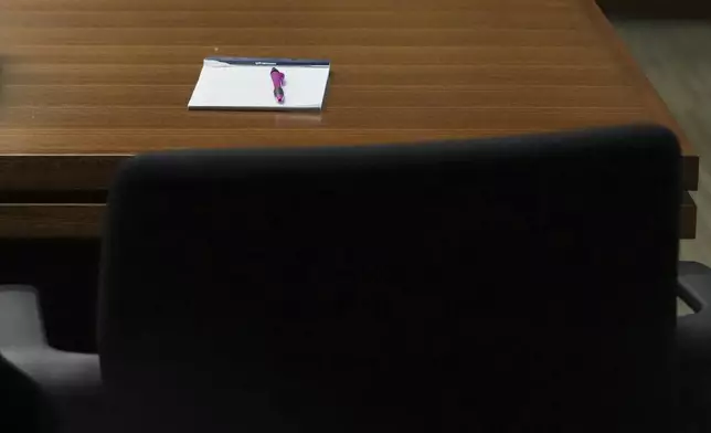 Robert Crimo III, who did not appear, seat is empty at the defense table during the sentencing hearing for Crimo III., at the Lake County Courthouse, in Waukegan, Ill., Wednesday, April 23, 2025. (AP Photo/Nam Y. Huh, Pool)