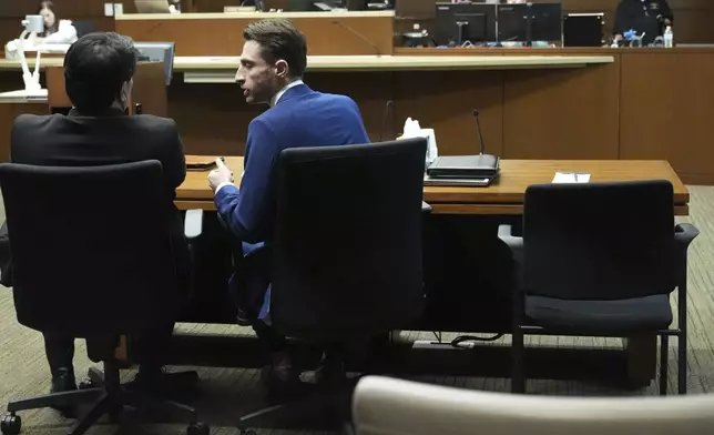 Robert Crimo III, who did not appear, seat is empty at the defense table during the sentencing hearing for Crimo III., at the Lake County Courthouse, in Waukegan, Ill., Wednesday, April 23, 2025. (AP Photo/Nam Y. Huh, Pool)