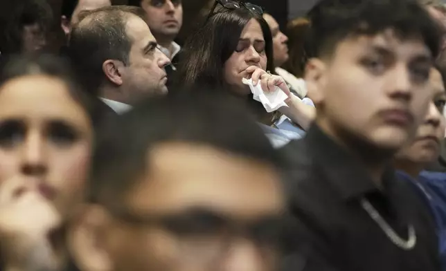 Elizabeth Turnipseed, top right, and Victims family members react during the sentencing hearing for Robert E. Crimo III., at the Lake County Courthouse, in Waukegan, Ill., Wednesday, April 23, 2025. (AP Photo/Nam Y. Huh, Pool)