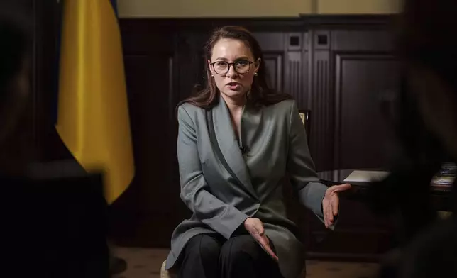 FILE - Yuliia Svyrydenko, Ukraine's Minister of Economy answers on journalists questions during an interview with the Associated Press in Kyiv, Ukraine, Jan. 16, 2024. (AP Photo/Evgeniy Maloletka, file)