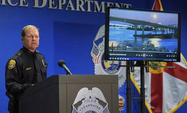 Clearwater, Fla., Police Chief Eric Gandy shows the media a boat crash video during a news conference Monday, April 28, 2025, in Clearwater, Fla., after multiple people were injured in the deadly accident Sunday night. (AP Photo/Chris O'Meara)
