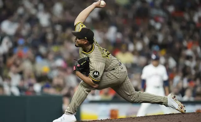San Diego Padres relief pitcher Jeremiah Estrada throws during the seventh inning of a baseball game against the San Diego Padres in Houston, Saturday, April 19, 2025. (AP Photo/Ashley Landis)