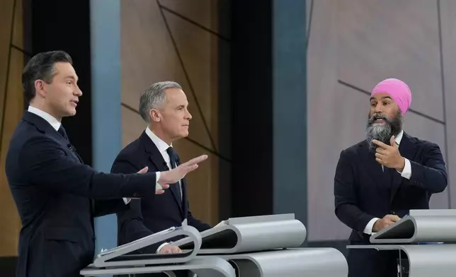 Conservative Leader Pierre Poilievre, from left, Liberal Leader Mark Carney and New Democratic Party Leader Jagmeet Singh participate in the English-language federal leaders' debate in Montreal, Thursday, April 17, 2025. (Christopher Katsarov/The Canadian Press via AP)
