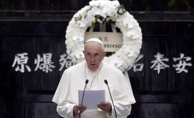 FILE - Pope Francis delivers his speech at the Atomic Bomb Hypocenter Park, in Nagasaki, Japan, Sunday, Nov. 24, 2019. (AP Photo/Gregorio Borgia, file)
