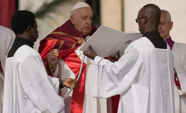 FILE - Pope Francis celebrates the Palm Sunday's Mass in St. Peter's Square at The Vatican Sunday, April 2, 2023 a day after being discharged from the Agostino Gemelli University Hospital in Rome, where he has been treated for bronchitis. (AP Photo/Andrew Medichini, File)