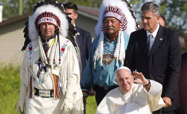 FILE - Pope Francis arrives for a pilgrimage on a second day of a "penitential" six-day visit to Canada to beg forgiveness from survivors of the country's residential schools, at the Lac Saint Anne, Canada, Tuesday, July 26, 2022. (AP Photo/Gregorio Borgia, File)