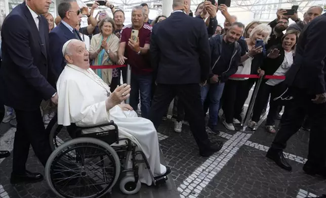 FILE - Pope Francis leaves the Agostino Gemelli University Polyclinic in Rome, Friday, June 16, 2023, nine days after undergoing abdominal surgery. (AP Photo/Andrew Medichini, file)