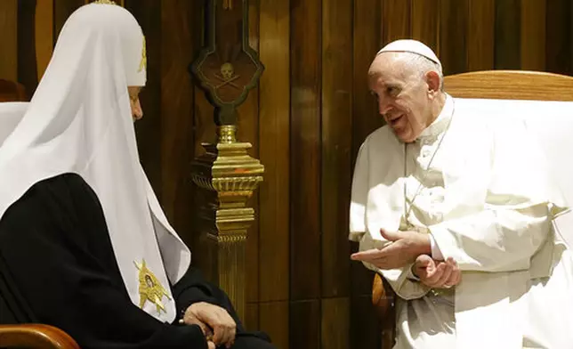 FILE - Pope Francis, right, and Russian Orthodox Church Patriarch Kirill talk during their meeting at the Jose Marti International airport in Havana, Cuba, Friday, Feb. 12, 2016. (AP Photo/Gregorio Borgia, file)
