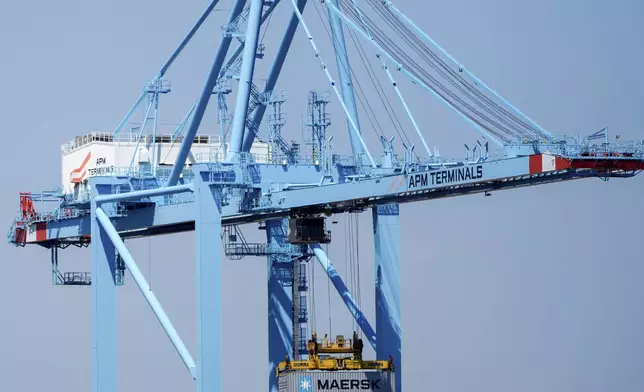 A shipping container is taken off the container ship Alexandra at the Port Newark Container Terminal, Friday, April 18, 2025, in Newark, N.J. (AP Photo/Julia Demaree Nikhinson)
