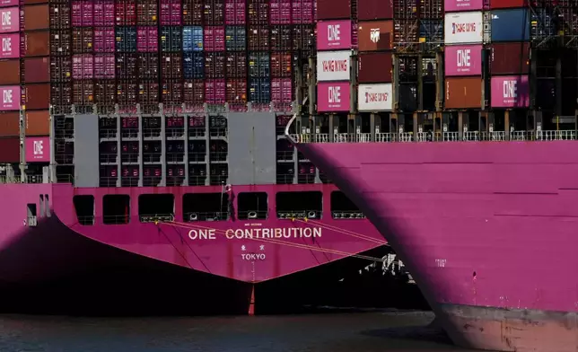 Shipping containers sit on the container ship One Contribution at Port Jersey, Friday, April 18, 2025, in Jersey City, N.J. (AP Photo/Julia Demaree Nikhinson)