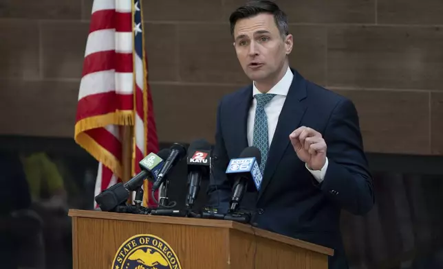 Oregon Attorney General Dan Rayfield speaks during a news conference at the Oregon Department of Justice office on Wednesday, April 23, 2025, in Portland, Ore. (AP Photo/Jenny Kane)