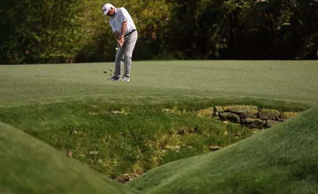 Fred Couples chips to the green on the 13th hole during the second round at the Masters golf tournament, Friday, April 11, 2025, in Augusta, Ga. (AP Photo/Julia Demaree Nikhinson)