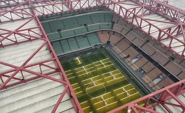 A view of the San Siro Stadium where the opening ceremony of the Milan Cortina 2026 Winter Olympics will take place, in Milan, Italy, Monday, Feb. 24, 2025. (AP Photo/Luca Bruno)