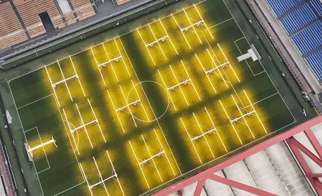 A view of the San Siro Stadium where the opening ceremony of the Milan Cortina 2026 Winter Olympics will take place, in Milan, Italy, Monday, Feb. 24, 2025. (AP Photo/Luca Bruno)