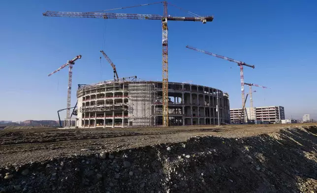 The Milano Santagiulia Ice Hockey Arena for the Milan Cortina 2026 Winter Olympics is under construction, in Assago, near Milan, Italy, Wednesday, Jan. 15, 2025. (AP Photo/Luca Bruno)