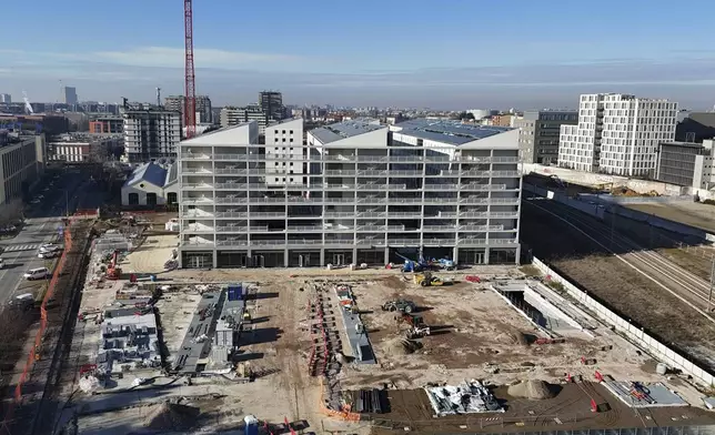 The Olympic village for the Milan Cortina 2026 Winter Olympics is under construction, in Milan, Italy, Saturday, Jan. 18, 2025. (AP Photo/Luca Bruno)