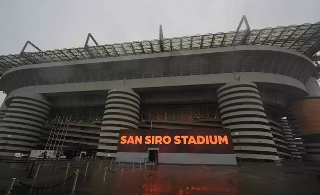Rain falls on San Siro Stadium, venue for the opening ceremony of the Milan Cortina 2026 Winter Olympics, in Milan, Italy, Monday, Jan. 27, 2025. (AP Photo/Luca Bruno)