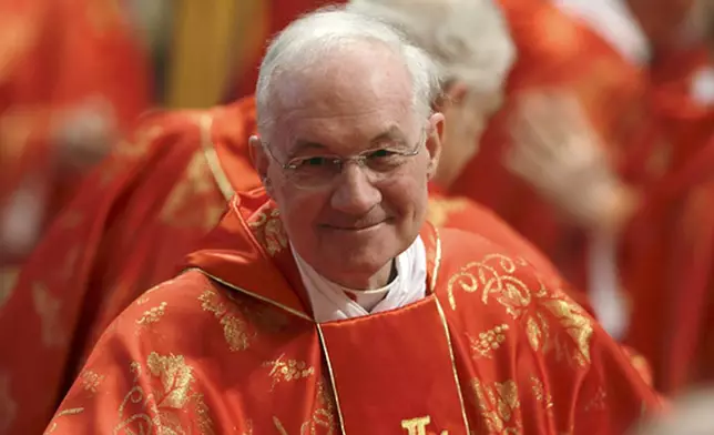 FILE - Canadian Cardinal Marc Ouellet attends a Mass inside St. Peter's Basilica, at the Vatican, on March 12, 2013. (AP Photo/Andrew Medichini, File)