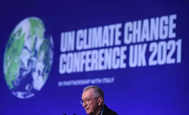 FILE - Vatican Secretary of State Cardinal Pietro Parolin speaks at the COP26 Summit, in Glasgow, Scotland, Tuesday, Nov. 2, 2021. (Daniel Leal Olivas /Pool Photo via AP, File)