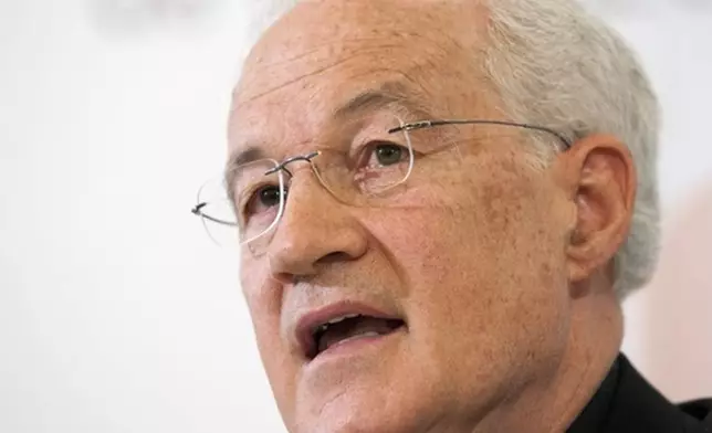 FILE - Canadian Cardinal Marc Ouellet responds to media at a news conference about his appointment by Pope Benedict XVI as Prefect of the Congregation for Bishops, Wednesday, June 30, 2010 in Quebec City, Canada. (AP Photo/The Canadian Press, Jacques Boissinot, File)