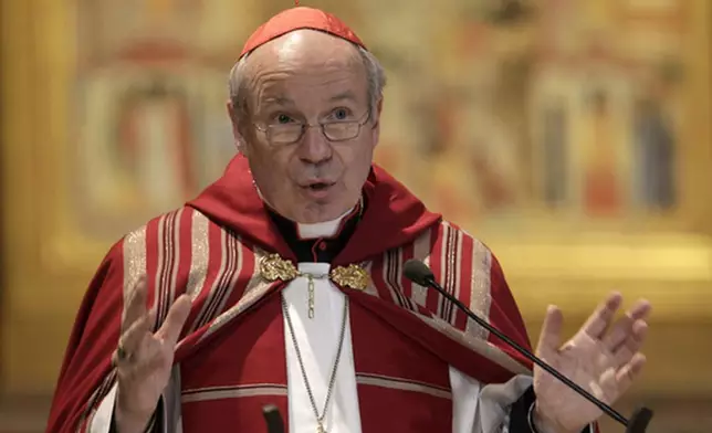 FILE - Austrian Cardinal Christoph Schoenborn attends a celebration at the St. Bartholomew church at the Tiberine Island in Rome, Monday, March 4, 2013. (AP Photo/Riccardo De Luca, File)