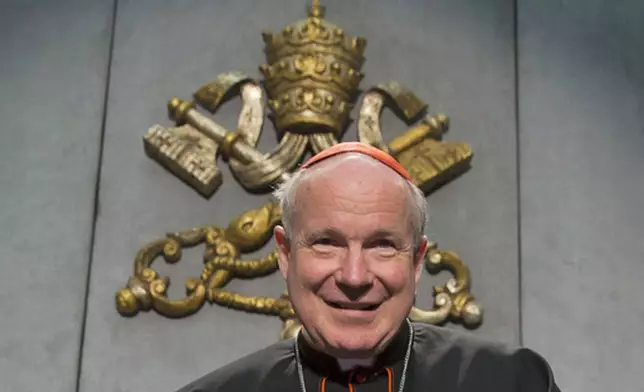FILE - Cardinal Christoph Schoenborn attends a press conference to present the post-synodal apostolic exhortation ' Amoris Laetitia ' (The Joy of Love), at the Vatican, Friday, April 8, 2016. (AP Photo/Andrew Medichini, File)
