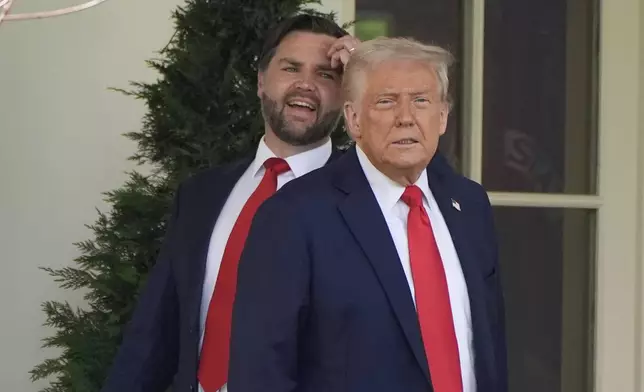 FILE - President Donald Trump and Vice President JD Vance pause near the Oval Office after and event to welcome the 2025 College Football National Champions, the Ohio State University football team on the South Lawn of the White House, April 14, 2025, in Washington. (AP Photo/Alex Brandon, File)