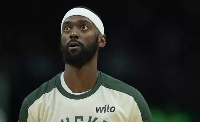 Milwaukee Bucks' Bobby Portis warms up before an NBA basketball game against the Minnesota Timberwolves, Tuesday, April 8, 2025, in Milwaukee. (AP Photo/Aaron Gash)
