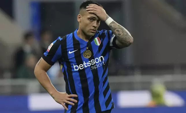 Inter Milan's Lautaro Martinez reacts during the Italian Cup semifinal second leg soccer match between Inter Milan and AC Milan at the San Siro stadium in Milan, Italy, Wednesday, April 23, 2025. (AP Photo/Luca Bruno)