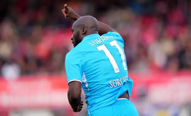 Napoli's Romelu Lukaku gestures, during the Serie A soccer match between Monza and Napoli at U-Power Stadium in Monza, Italy, Saturday April 19, 2025. (Spada/LaPresse via AP)