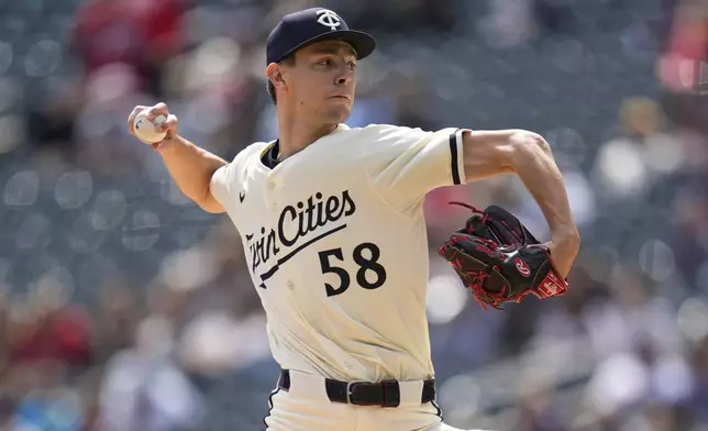 Minnesota Twins starting pitcher David Festa (58) delivers during the first inning of a baseball game against the New York Mets, Wednesday, April 16, 2025, in Minneapolis. (AP Photo/Abbie Parr)