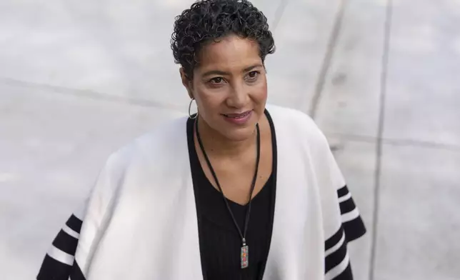 Jessie Schutt-Aine, the executive director of the Clara Lionel Foundation, poses for a portrait, Tuesday, March 4, 2025, in Kensington, Md. (AP Photo/Julia Demaree Nikhinson)