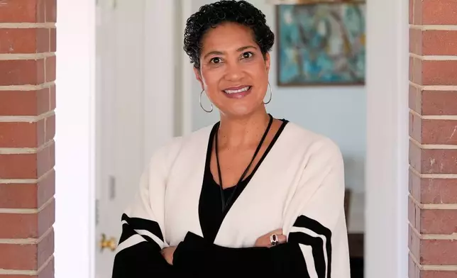 Jessie Schutt-Aine, the executive director of the Clara Lionel Foundation, poses for a portrait, Tuesday, March 4, 2025, in Kensington, Md. (AP Photo/Julia Demaree Nikhinson)
