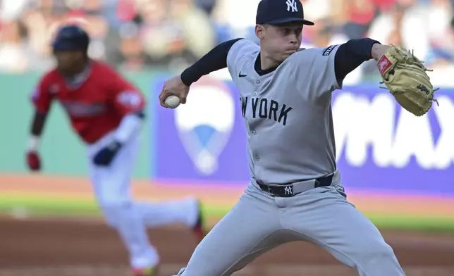 New York Yankees starting pitcher Will Warren delivers during the first inning of a baseball game against the Cleveland Guardians Tuesday, April 22, 2025, in Cleveland. (AP Photo/David Dermer)