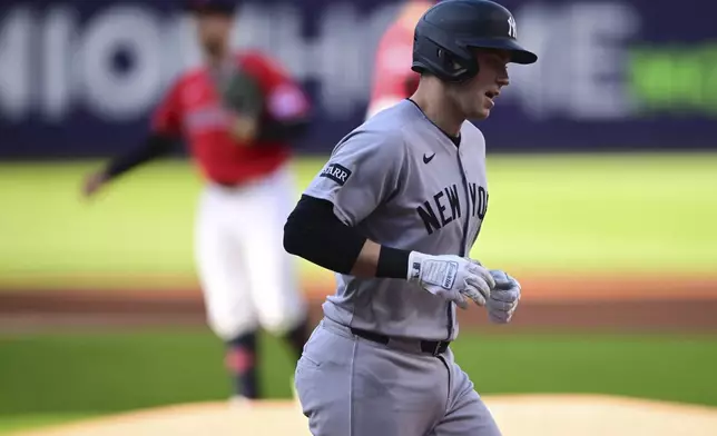 New York Yankees first baseman Ben Rice runs the bases after hitting a solo home run off Cleveland Guardians starting pitcher Tanner Bibee during the first inning of a baseball game Tuesday, April 22, 2025, in Cleveland. (AP Photo/David Dermer)