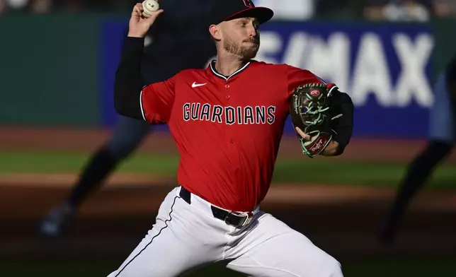 Cleveland Guardians starting pitcher Tanner Bibee delivers during the first inning of a baseball game against the New York Yankees Tuesday, April 22, 2025, in Cleveland. (AP Photo/David Dermer)