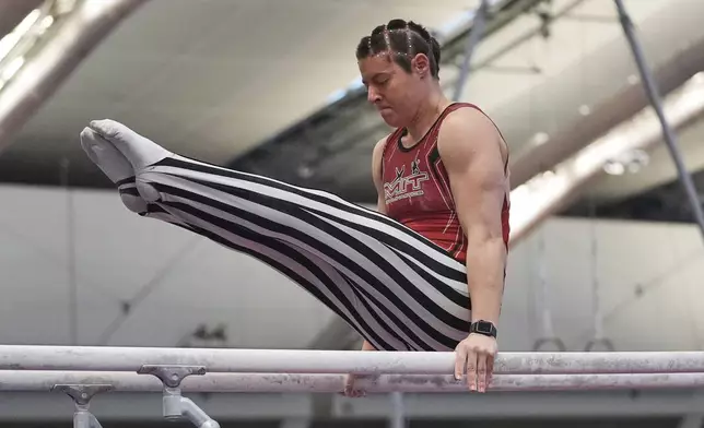 Julia Sharpe, of the MIT Gymnastic Club of Boston, competes on the parallel bars at the 2025 NAIGC national competition in Pittsburgh, Friday, April 4, 2025. (AP Photo/Gene J. Puskar)