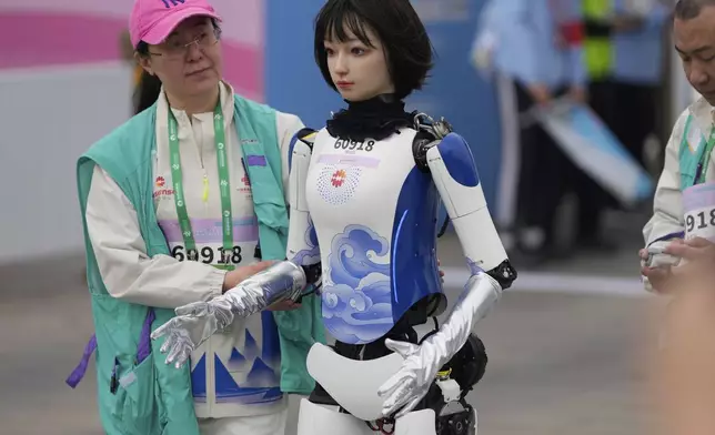 A robot attends the Humanoid Robot Half-Marathon held in Beijing on Saturday, April 19, 2025. (AP Photo/Ng Han Guan)