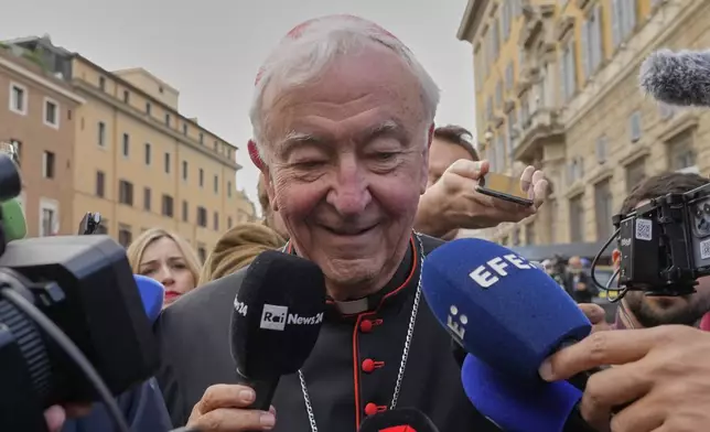 British Cardinal Vincent Nichols is approached by reporters as he arrives for a college of cardinals' meeting, at the Vatican, Monday, April 28, 2025. (AP Photo/Gregorio Borgia)