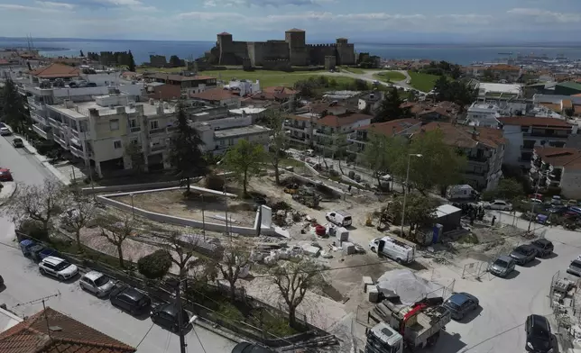 A drone photo shows a square where mass graves have been uncovered with remains believed to be dozens of prisoners slain during or after the Greek Civil War, in Thessaloniki, Greece, on Saturday, April 12, 2025. (AP Photo/Thanassis Stavrakis)