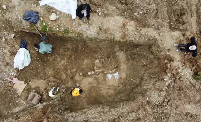Construction crews uncover a mass grave in the city of Thessaloniki, Greece, on Feb. 28, 2025, containing remains believed to belong to dozens of prisoners executed during or after the Greek civil war. (Municipality of Neapoli-Sykies via AP)