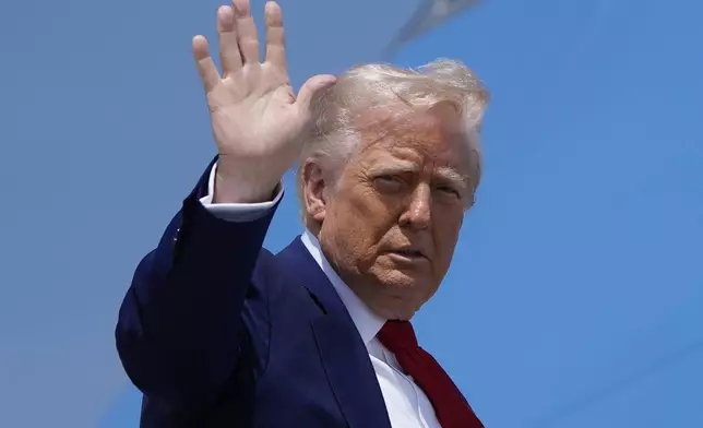 President Donald Trump waves as he boards Air Force One, Tuesday, April 29, 2025, at Joint Base Andrews, Md. (AP Photo/Alex Brandon)