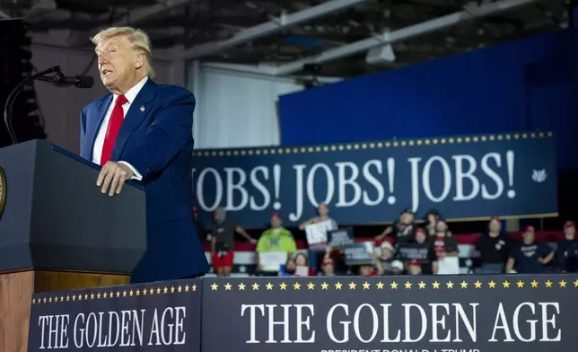 President Donald Trump speaks on his first 100 days at Macomb County Community College Sports Expo Center, Tuesday, April 29, 2025, in Warren, Mich. (AP Photo/Alex Brandon)
