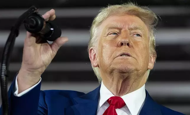 President Donald Trump speaks on his first 100 days at Macomb County Community College Sports Expo Center, Tuesday, April 29, 2025, in Warren, Mich. (AP Photo/Alex Brandon)