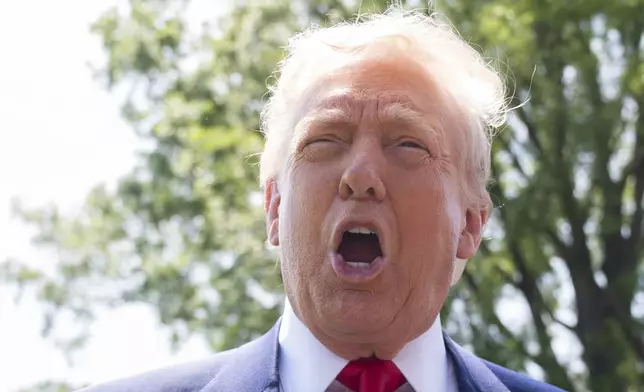 President Donald Trump speaks to reporters as he leaves the White House en route to attend a rally in Macomb County, Mich., to mark the 100th day of his second term in office, Tuesday, April 29, 2025, in Washington. (AP Photo/Manuel Balce Ceneta)