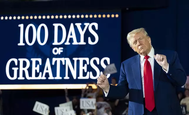 President Donald Trump arrives to speak on his first 100 days at Macomb County Community College Sports Expo Center, Tuesday, April 29, 2025, in Warren, Mich. (AP Photo/Alex Brandon)