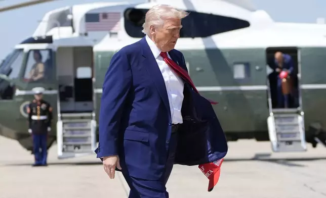 President Donald Trump boarding Air Force One, Tuesday, April 29, 2025, at Joint Base Andrews, Md. (AP Photo/Alex Brandon)