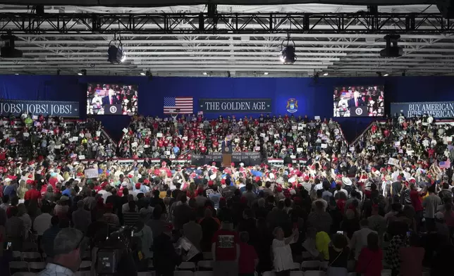 President Donald Trump speaks on his first 100 days at Macomb County Community College Sports Expo Center, Tuesday, April 29, 2025, in Warren, Mich. (AP Photo/Paul Sancya)